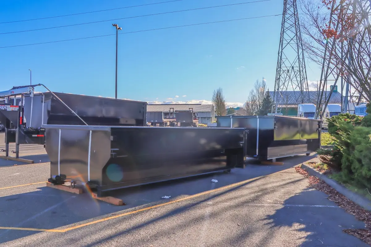 Roll-off dumpster ready for waste disposal at job site for Construction Dumpster Rental in New Smyrna Beach